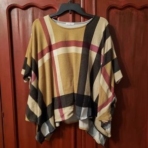 Swing hem poncho top